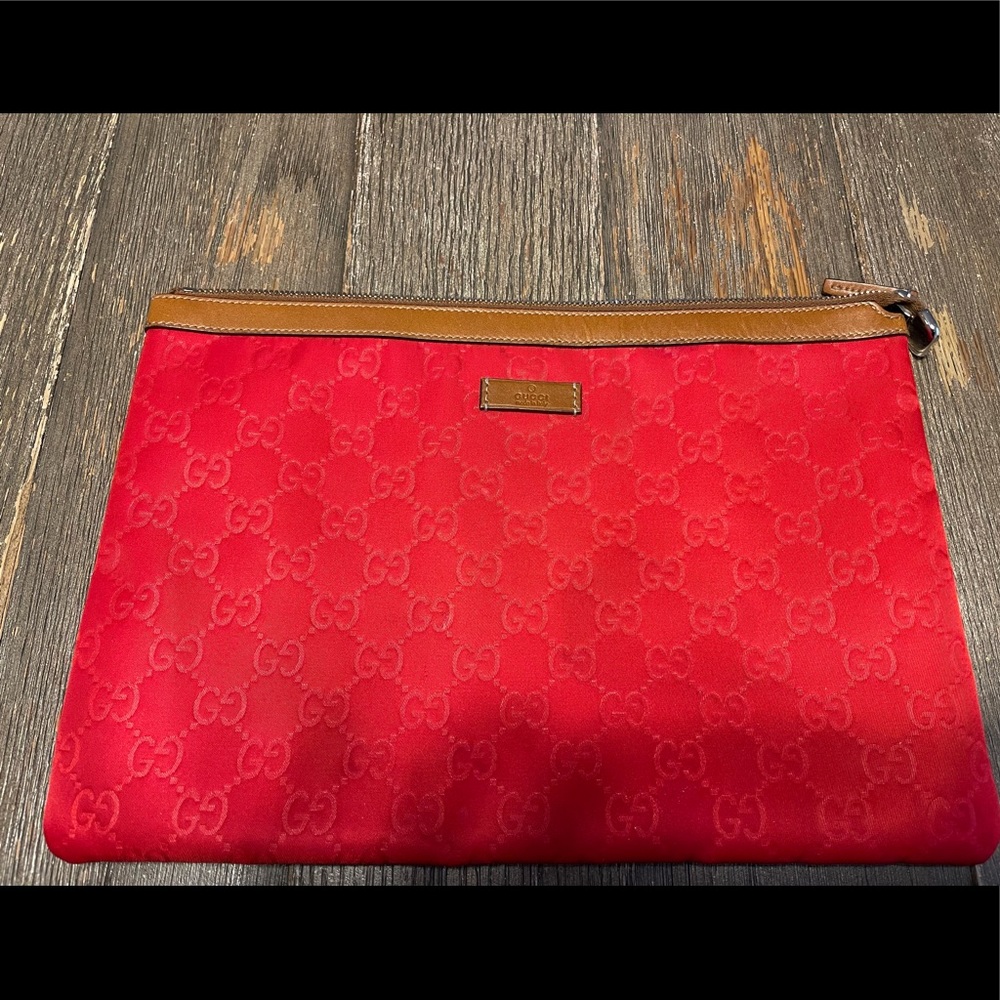 Authentic Red Gucci clutch bag.
